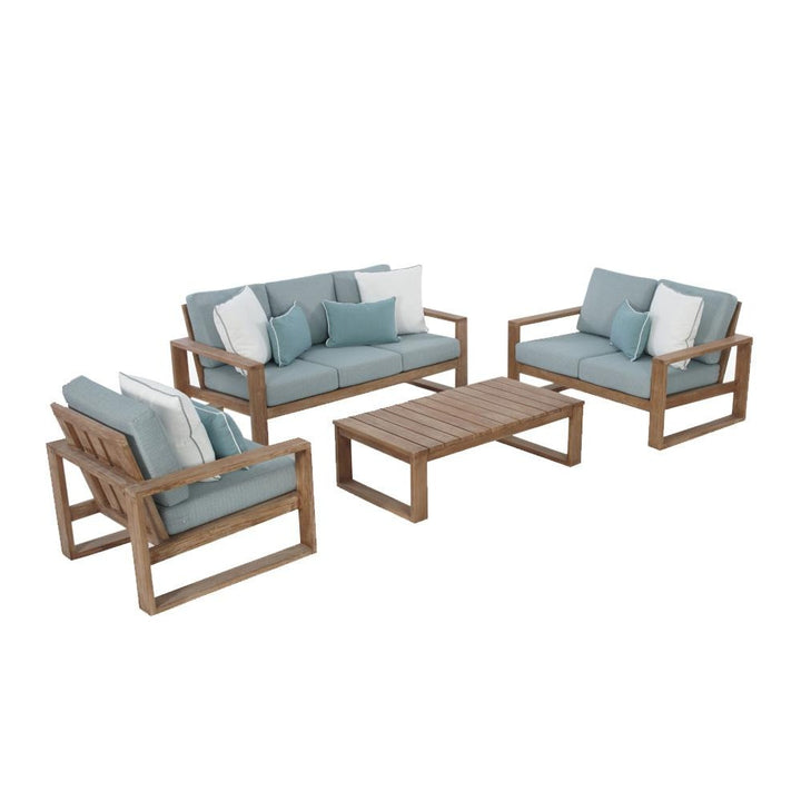 6 seater teak garden sofa set with light blue cushions and teak wood coffee table on a white background